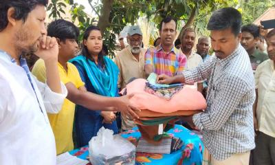 নীলফামারীতে ক্ষতিগ্রস্তদের মাঝে সহায়তা প্রদান