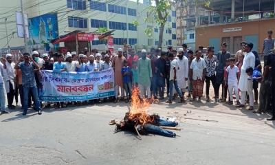 ফরিদপুরে সাম্প্রদায়িক উসকানির প্রতিবাদে কুশপুত্তলিকা দাহ