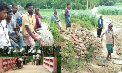 আবাদি জমিতে জোরপূর্বক রাস্তা নির্মাণের অভিযোগ