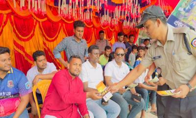 বালিয়াকান্দিতে মাদকদ্রব্য নিয়ন্ত্রণ অধিদপ্তরের লিফলেট বিতরণ