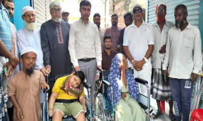 জয়পুরহাটে লাল-সবুজ প্রতিবন্ধী সংস্থার কার্যালয় উদ্বোধন ও হুইলচেয়ার বিতরণ