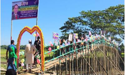 কাঠের সেতু সংস্কার: স্বস্তিতে কলমাকান্দার ১০ গ্রামের মানুষ