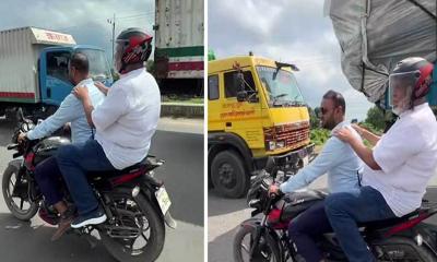 যানজটে আটকা পড়লেন উপদেষ্টা, গাড়ি ছেড়ে চড়লেন মোটরসাইকেলে