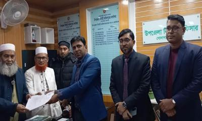গোদাগাড়ীতে অধ্যাপক মুজিবুর রহমানের মনোনয়নপত্র দাখিল