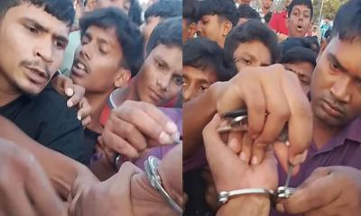 ছাত্রলীগ নেতাকে হ্যান্ডকাপ পরিয়ে আটকের পর তোপের মুখে ছেড়ে দিল পুলিশ